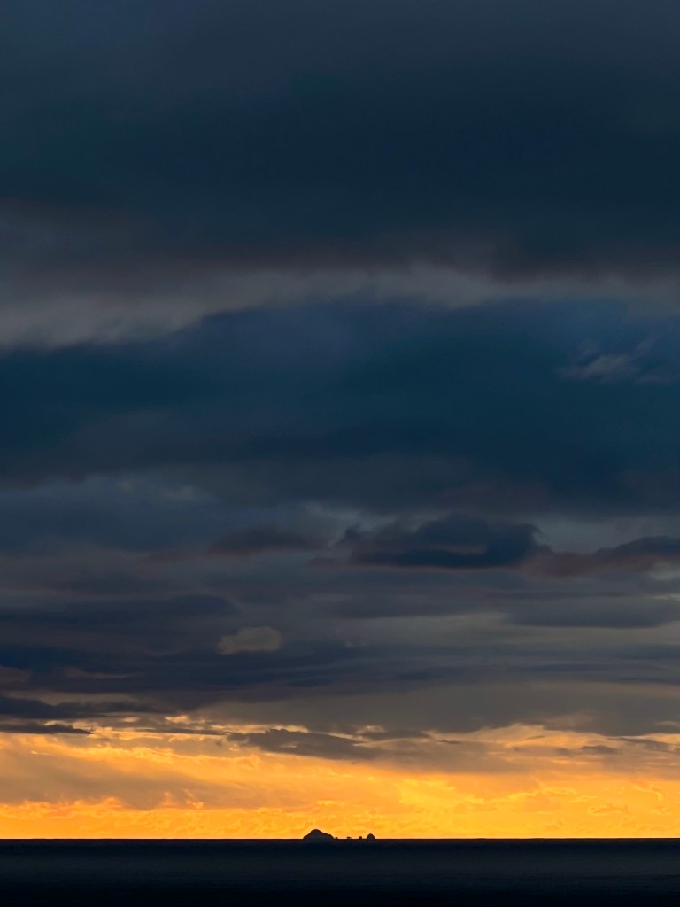 silhouette of the Farallon Islands at sunset